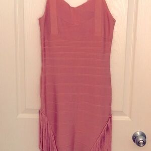 This is a Herve faux coral colored dress.